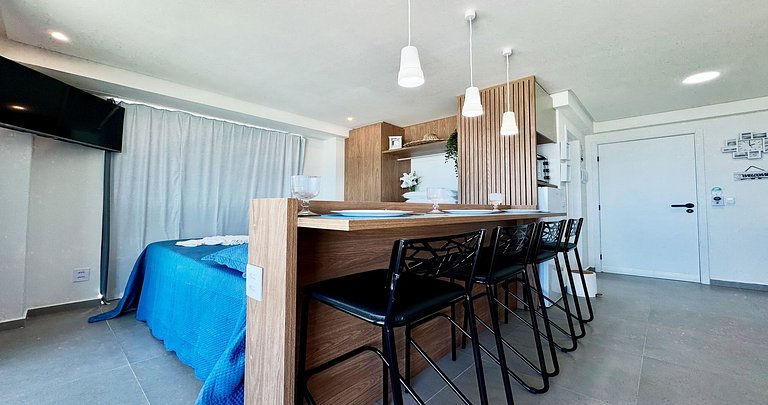 Studio para casais com varanda e vista mar