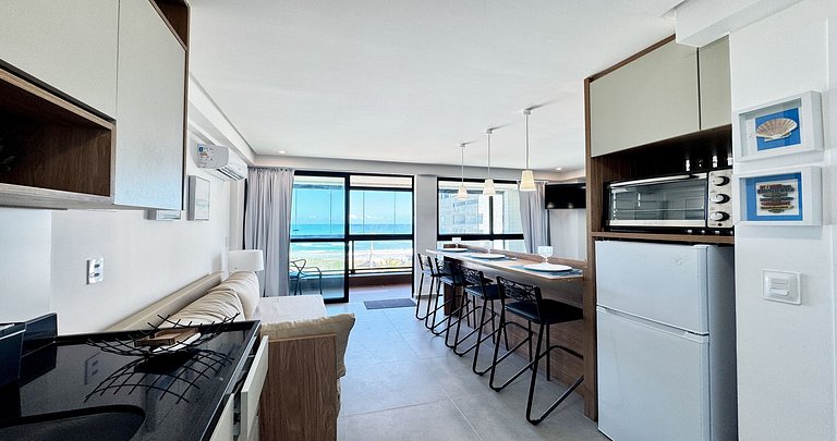 Studio para casais com varanda e vista mar